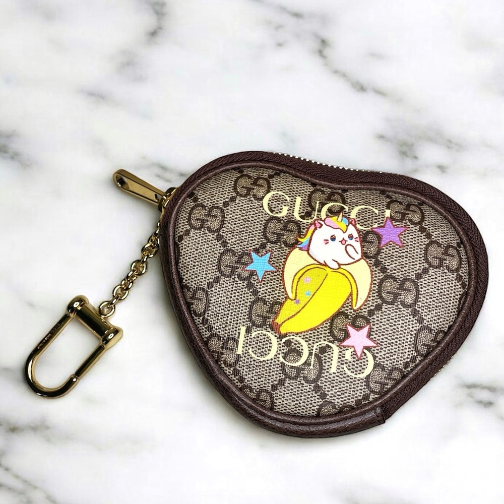 Excellent limited edition Gucci pouch Bananya cat key chain - authenticated